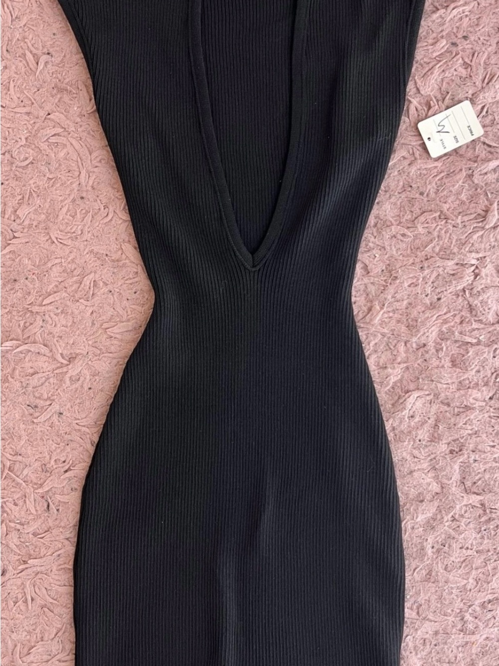 Sleek Black Backless Ribbed V-Neck Romper